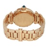 An image of a pre-owned men's Cartier wristwatch, captured from a slightly elevated angle focusing on the back. The watch features a gold-tone metal bracelet and a round case with engraved details. The crown is adorned with a blue cabochon. The bracelet is laid out in a semi-circle, showcasing its links and clasp, with the watch positioned at a close distance for detailed viewing.