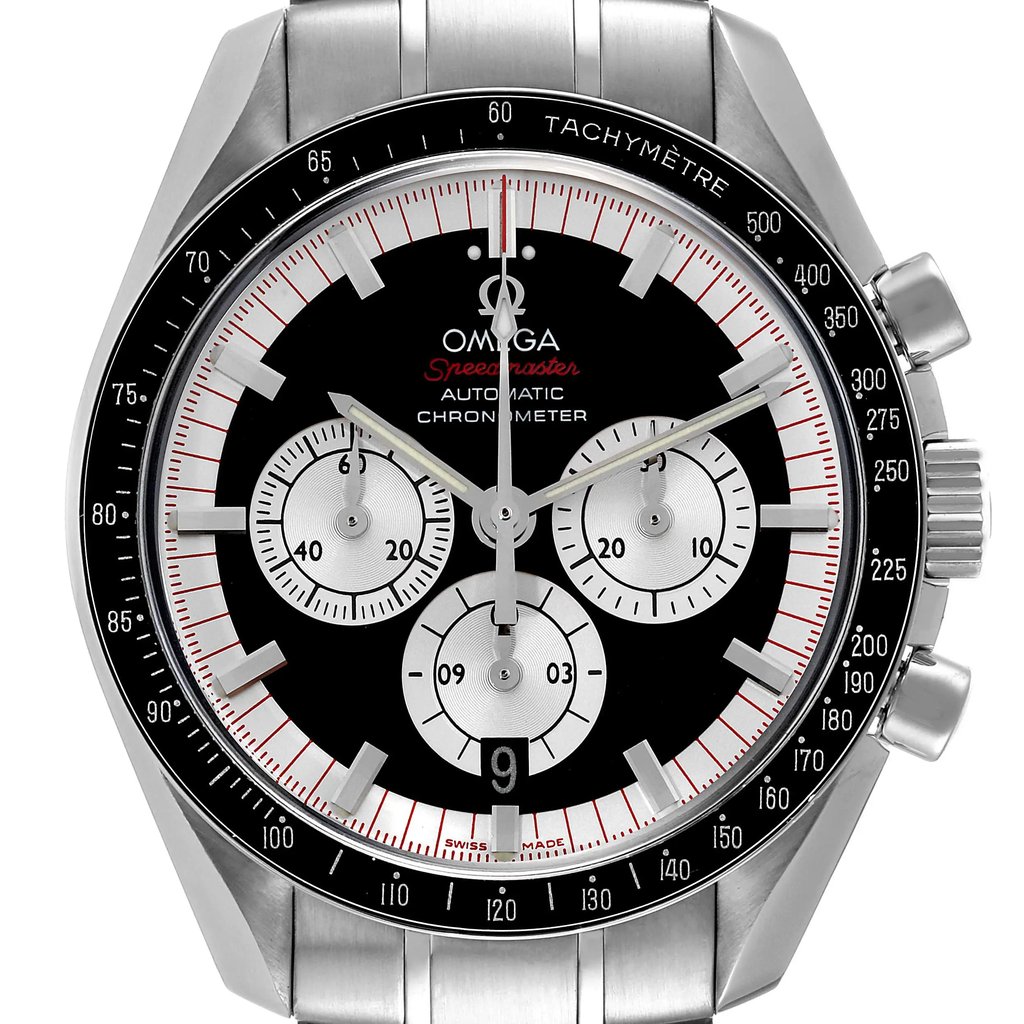 An image of a pre-owned wristwatch showing a close-up front view of the watch face. The watch features a black dial with three subdials and a tachymetric scale on the bezel. The brand name is visible on the face, and the watch has a stainless steel case and bracelet.