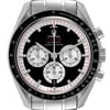 An image of a pre-owned wristwatch showing a close-up front view of the watch face. The watch features a black dial with three subdials and a tachymetric scale on the bezel. The brand name is visible on the face, and the watch has a stainless steel case and bracelet.