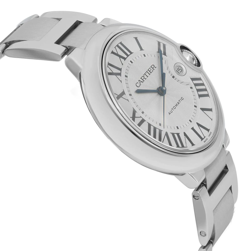 An image of a pre-owned wristwatch viewed from a side profile angle, opposite the crown. The watch features a silver-toned bracelet and a round face with Roman numerals. The angle highlights the thickness and craftsmanship of the watch casing, with a slightly elevated perspective capturing the design details. The image is taken from a close distance, focusing on the side and face of the watch.