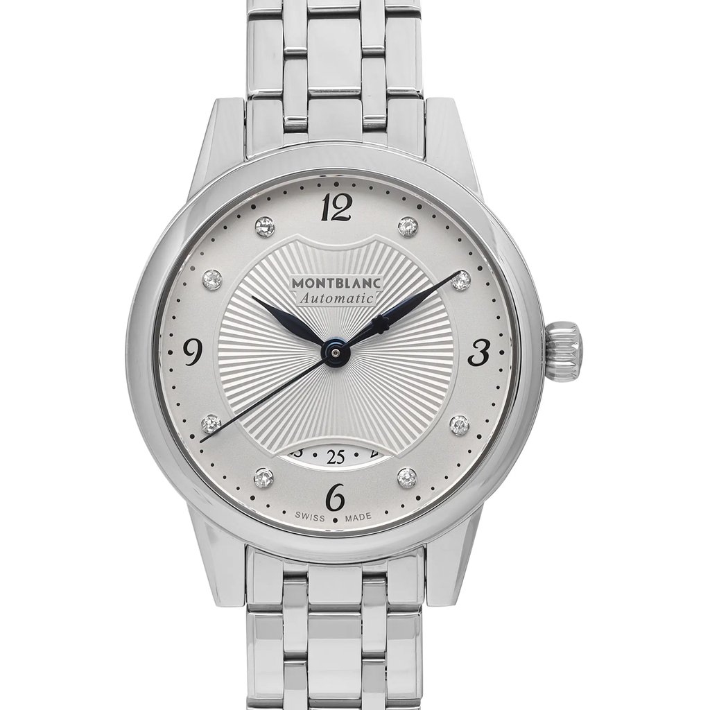 An image of a pre-owned Montblanc women's wristwatch in excellent condition, with a close-up front view of the watch face. The silver guilloche dial is accented by gray bezel and features Arabic numerals at 12, 3, 6, and 9 o'clock, along with diamond markers at the other hours. It also includes a date indicator above the 6 o'clock position. The round case and band are made of stainless steel, and the watch is styled for dress/formal occasions. The hands of the watch are positioned in a way that indicates the time as ten minutes past ten. The Montblanc logo and the word "Automatic" are printed above the center of the dial, and "Swiss Made" is printed below the 6 o'clock marker. The crown of the watch is visible on the right side of the case. The image is taken from a close distance, capturing the watch face and part of the strap, with a focus on the details and craftsmanship of the timepiece.