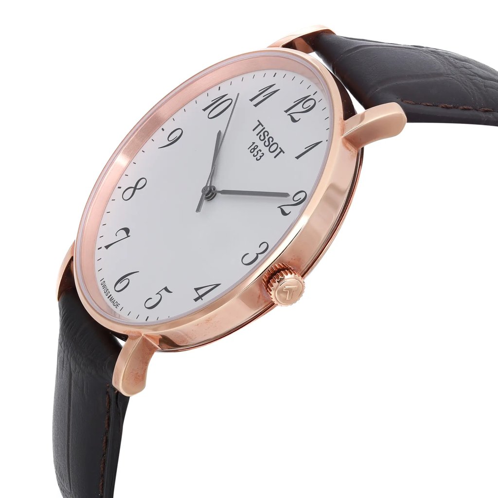 An image of a Wristwatch by Tissot. This Pre Owned item is designed for Men, featuring a Dress/Formal style. It has a Quartz movement and an Analog display with a White dial color. The indices include 12-Hour Dial,Arabic Numerals. The band is made of Leather and the case is made of Stainless Steel. The watch has a Round shape with a case size of 42 mm and a case thickness of 7 mm.