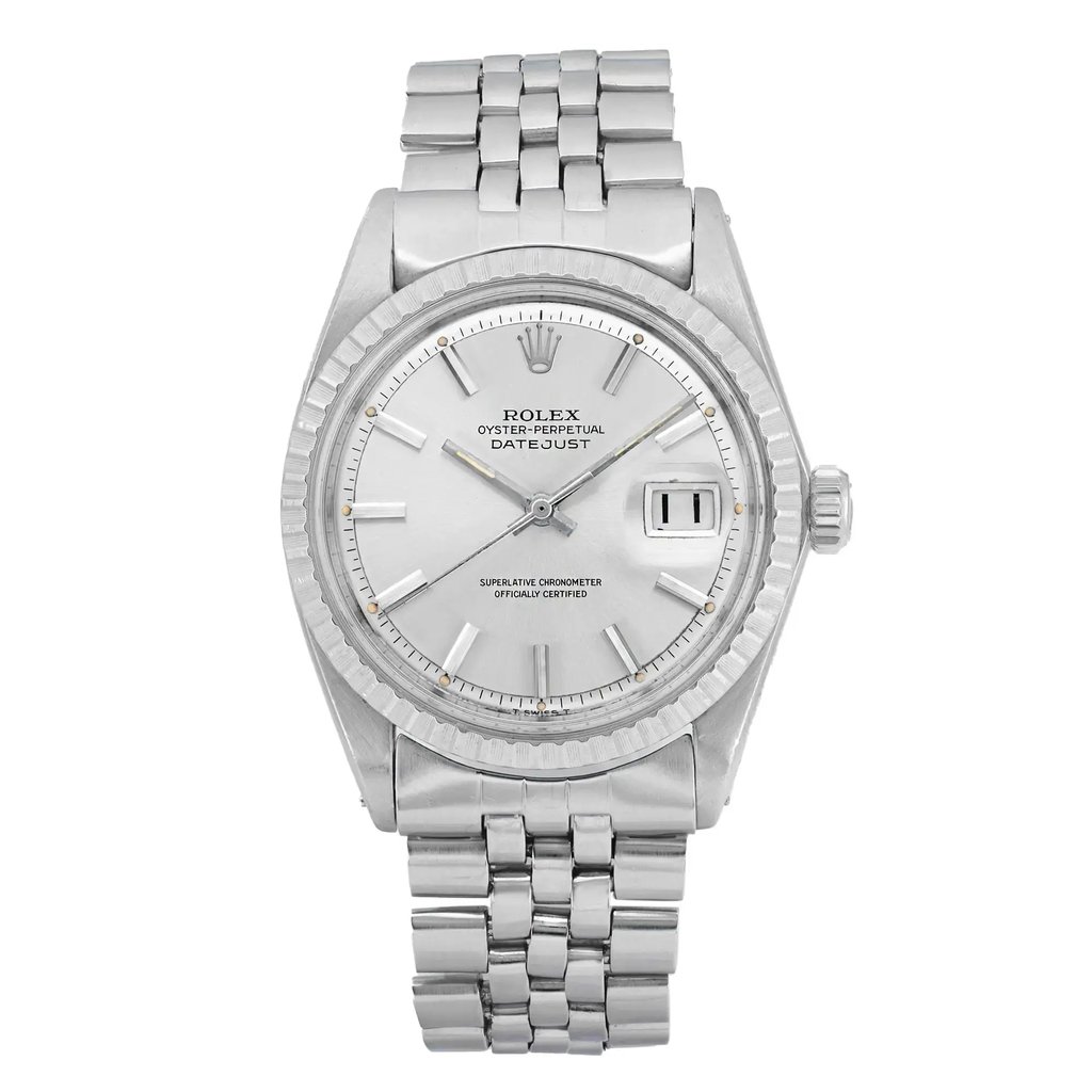 An image of a pre-owned wristwatch shown from a front full frontal view. The watch features a metallic band and a round face with a date display. The brand is not specified. The photograph is taken at a close distance, highlighting the details of the watch's design and condition.
