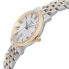An image of a Wristwatch by Tissot. This Pre Owned item is designed for Women, featuring a Casual style. It has a Quartz movement and an Analog display with a Gray dial color. The indices include 12-Hour Dial,Roman Numerals. The band is made of Stainless Steel and the case is made of Stainless Steel. The watch has a Round shape with a case size of 30 mm and a case thickness of 7 mm.