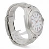 An image of a pre-owned men's Rolex wristwatch positioned at a slight angle, showcasing the left side and face of the watch. The watch features a stainless steel band and a white dial with luminous hands and hour markers. The photo is taken at a close distance, highlighting the details of the watch's design and condition.