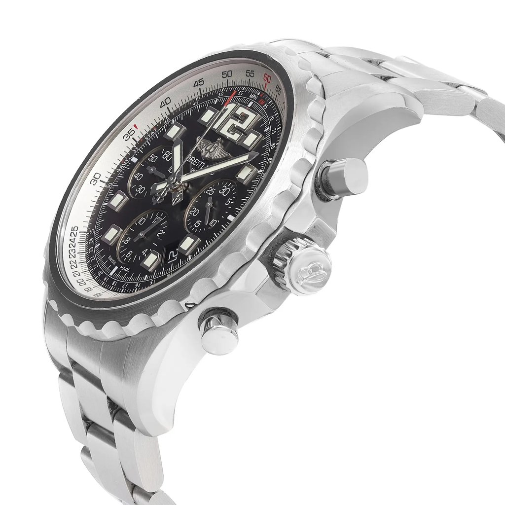 An image of a pre-owned Breitling luxury men's wristwatch with a side profile view showcasing the crown. The watch has a round stainless steel case and band, with a black dial featuring multiple subdials and a steel bezel. The watch is photographed at a close distance, highlighting the textures and details of the design, including the numerical hour markers and the Breitling logo on the crown. The watch is pre-owned and may show signs of wear and scratches.