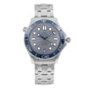 An image of a new wristwatch shown from a full frontal view. The watch features a metallic band and a detailed dial with blue accents. The image is taken from a close distance, highlighting the intricate design and craftsmanship of the watch face and bezel.