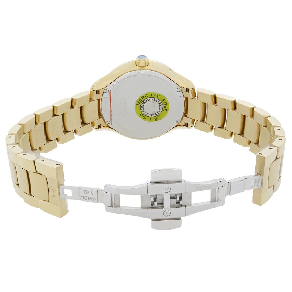 An image of a pre-owned wristwatch showing the back view with an open clasp. The watch has a gold-tone metal bracelet, and the back of the watch case displays a label indicating it is "Mercury Free." The open clasp, positioned in the foreground, reveals the internal mechanism. The image is taken from a slightly elevated angle at a close distance, highlighting the details of the clasp and bracelet links.