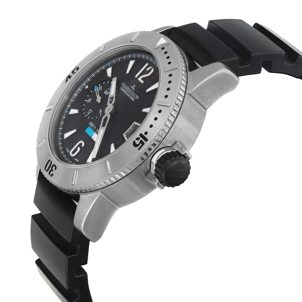 An image of a pre-owned wristwatch viewed from a side profile angle, showcasing the crown prominently. The watch has a silver bezel with engraved numerals and a black watch face. The black strap is partially visible, and the overall angle highlights the watch’s thickness and details on the side.