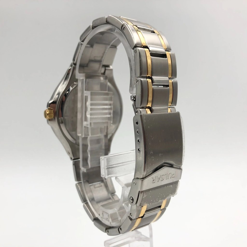 Back View Of {Caseback} Back Case And Closed Stainless Steel Band Of Pulsar PXH097 Watch Unworn Condition