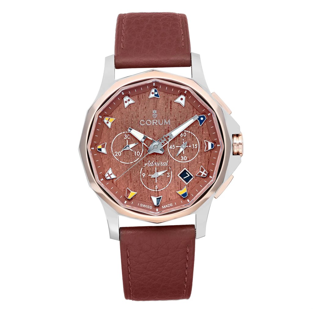 An image of a Wristwatch by Corum. This Display Model item is designed for Men, featuring a Luxury style. It has a Mechanical (Automatic) movement and an Analog display with a Brown dial color. The indices include 12-Hour Dial,Arrow Markers. The band is made of Leather and the case is made of Stainless Steel. The watch has a Round shape with a case size of 42 mm and a case thickness of 13 mm.