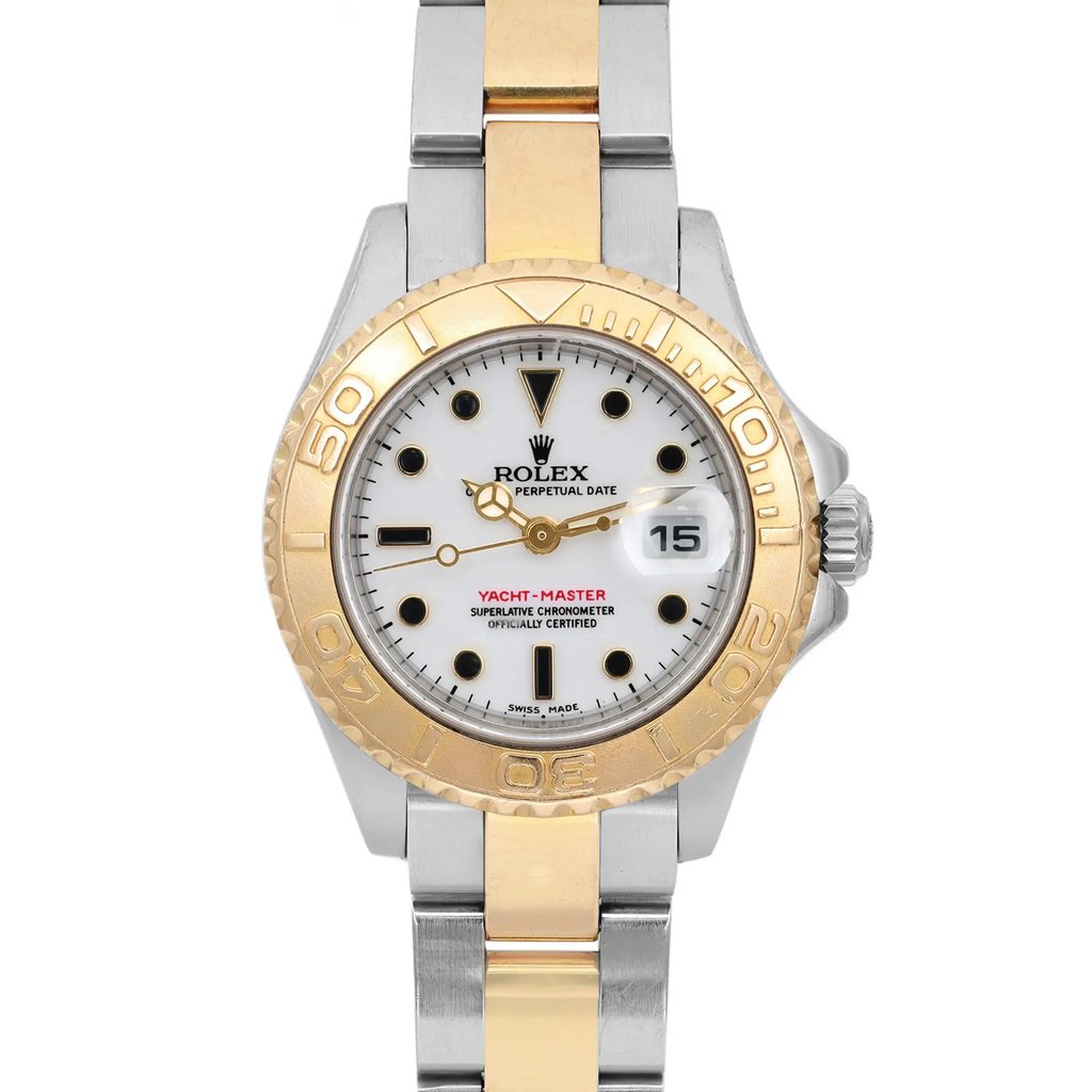 An image of a pre-owned wristwatch captured in a front close-up shot, focusing on the watch face. The watch features a white dial with gold and silver accents, including a gold bezel and a two-tone metal bracelet. The watch's hands and hour markers are clearly visible, along with a date window on the right side.