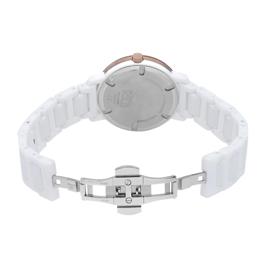 An image of a wristwatch in a back view position, showcasing the open clasp. The watch features a white band and a round case with a silver back. The clasp is fully extended, displaying its intricate metal components. The angle is straight on, providing a clear and detailed view of the watch's back and clasp from a moderate distance. The watch is new but noted as having defects.
