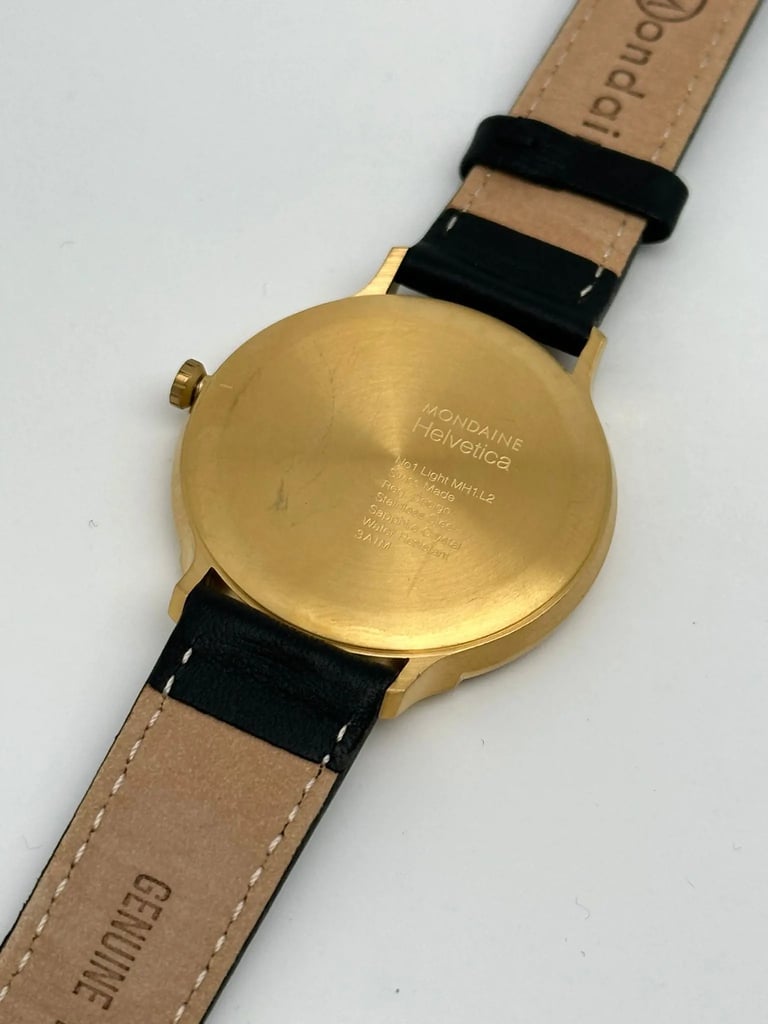 Back View Of Snap Back Case And Open Leather Band Of Mondaine MH1.L2211.LB Watch Pre Owned Condition