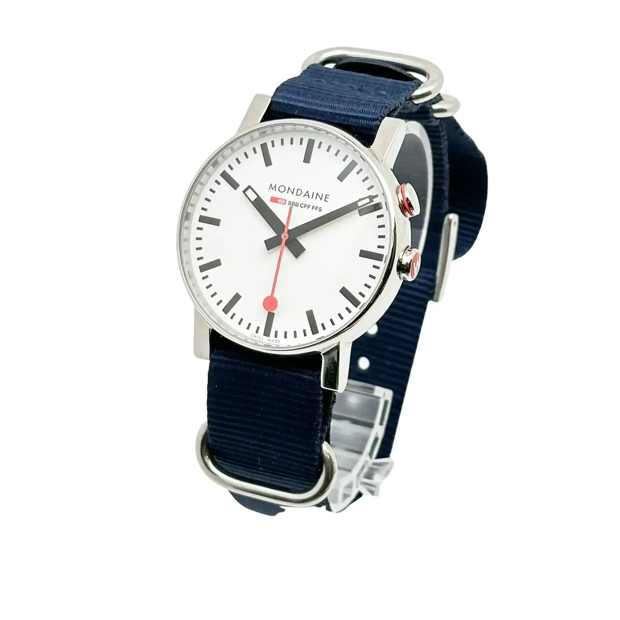 An image of a Wristwatch by Mondaine. This Pre Owned item is designed for Men, featuring a Casual,Classic style. It has a Quartz movement and an Analog display with a White dial color. The indices include 12-Hour Dial,Stick Indexes. The band is made of Nylon and the case is made of Stainless Steel. The watch has a Round shape with a case size of 40 mm and a case thickness of 12 mm.