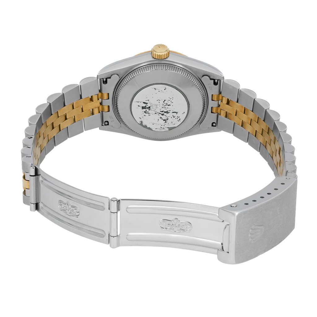 An image of a pre-owned wristwatch from a back view, showcasing the open clasp. The watch features a two-tone metal bracelet with silver and gold links. The watch case back is visible, displaying some wear. The clasp is open, revealing engraved details. The angle is slightly elevated, capturing the entire bracelet and clasp from a close distance.