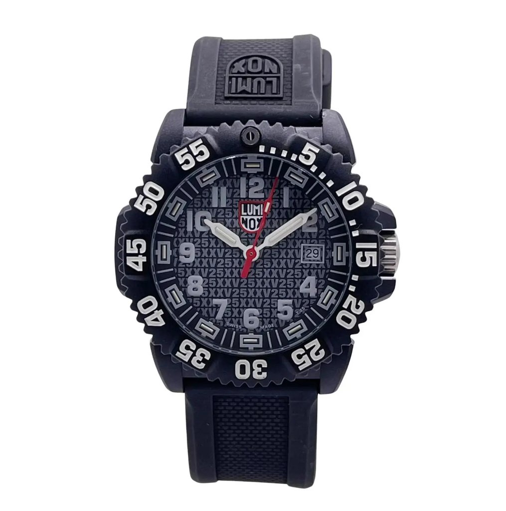 An image of a Wristwatch by Luminox. This Pre Owned item is designed for Men, featuring a Casual,Diver style. It has a Quartz movement and an Analog display with a Black dial color. The indices include 12-Hour Dial,Arabic Numerals,Easy to Read/Large Numerals. The band is made of Rubber and the case is made of Carbon. The watch has a Round shape with a case size of 44 mm and a case thickness of 15 mm.