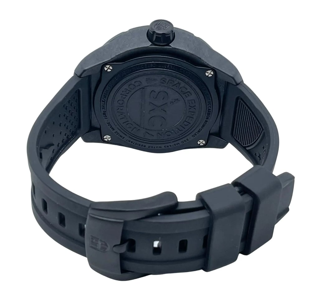 An image of a Wristwatch by Luminox. This Pre Owned item is designed for Men, featuring a Casual,Classic,Diver,Military style. It has a Quartz movement and an Analog display with a Blue dial color. The indices include 12-Hour Dial,Arabic Numerals,Easy to Read/Large Numerals,Stick Indexes. The band is made of Silicone and the case is made of Carbon. The watch has a Round shape with a case size of 46 mm and a case thickness of 15 mm.