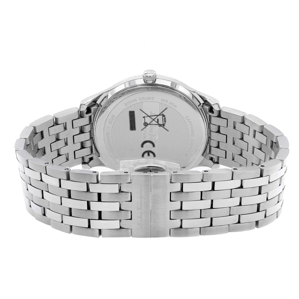 An image of a Wristwatch by Salvator Ferragamo. This Unworn item is designed for Women, featuring a Casual,Classic,Dress/Formal style. It has a Quartz movement and an Analog display with a Stainless Steel dial color. The indices include 12-Hour Dial,Stick Indexes. The band is made of Stainless Steel and the case is made of Stainless Steel. The watch has a Round shape with a case size of 35 mm and a case thickness of 7 mm.