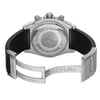 An image of a pre-owned Breitling men's wristwatch, viewed from the back with an open deployant clasp. The watch is positioned centrally and shot from a direct, level angle, with the camera's distance allowing to capture the entire back view of the watch. The caseback is screwback stainless steel, engraved with branding and watch specifications, while the black rubber band connects to a stainless steel clasp inscribed with the brand's name. The watch is round in shape, showcasing the contrasting materials and design details. The band may show light signs of wear.