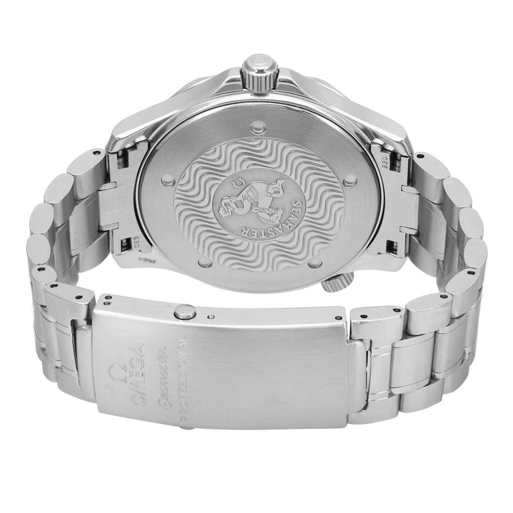 An image of a pre-owned wristwatch displaying the back view with a focus on the closed clasp. The watch features a metal link bracelet and a detailed engraving on the case back. The photograph is taken from a close distance, highlighting the intricate design and craftsmanship of the clasp and the watch's branding.