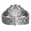 An image of a pre-owned TAG Heuer men's wristwatch, viewed from the back with the clasp closed. The watch is positioned at a slight angle, allowing a clear view of the stainless steel caseback which features an exhibition design showcasing the internal movement marked "Calibre 16." The watch's round shape is apparent from this angle, and the stainless steel band connects to the case with a fold-over clasp with double push buttons, partially visible to the side. The image is taken from a close distance, emphasizing the watch's details and potential minor blemishes from handling and shipping.