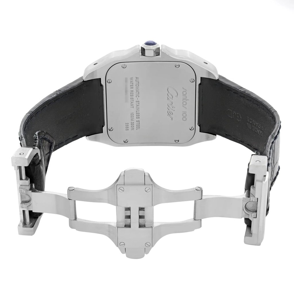 An image of a pre-owned Cartier men's wristwatch with the back view prominently displayed. The watch has a square stainless steel caseback with a screwback design, secured with a leather band. A butterfly clasp is shown in an open position, with the components visible and slightly angled towards the camera. The watch is positioned at a medium distance, with the back of the watch centered and in focus, allowing clear visibility of the engravings and brand hallmark.