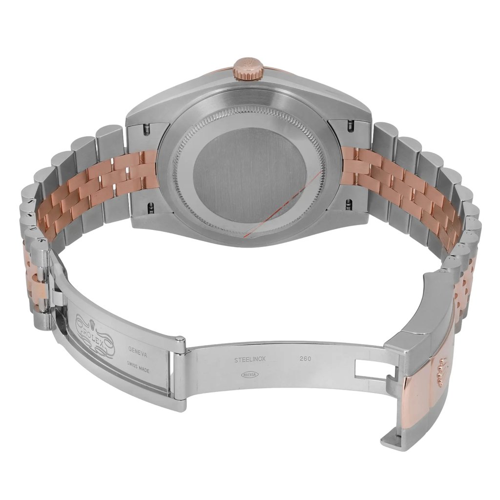 An image of a pre-owned men's Rolex wristwatch viewed from the back. The watch is positioned at a slight angle, showcasing the closed clasp and the stainless steel and rose gold bracelet. The focus is on the back of the watch case, highlighting the brand's engraved details on the clasp. The image is taken from a close distance to capture the intricate design elements.