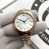 An image of a Wristwatch by Michael Kors. This Display Model item is designed for Women, featuring a Dress/Formal style. It has a Quartz movement and an Analog display with a Silver dial color. The indices include 12-Hour Dial,Stick Indexes. The band is made of Stainless Steel and the case is made of Stainless Steel. The watch has a Round shape with a case size of 38 mm and a case thickness of 7 mm.