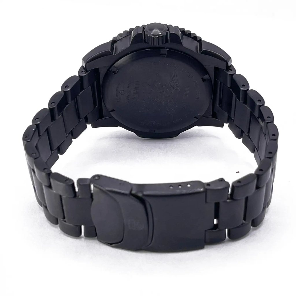 An image of a Wristwatch by Luminox. This Pre Owned item is designed for Men, featuring a Diver,Military style. It has a Quartz movement and an Analog display with a Black dial color. The indices include 12-Hour Dial,Arabic Numerals. The band is made of Stainless Steel and the case is made of Stainless Steel. The watch has a Round shape with a case size of 45 mm and a case thickness of 14 mm.