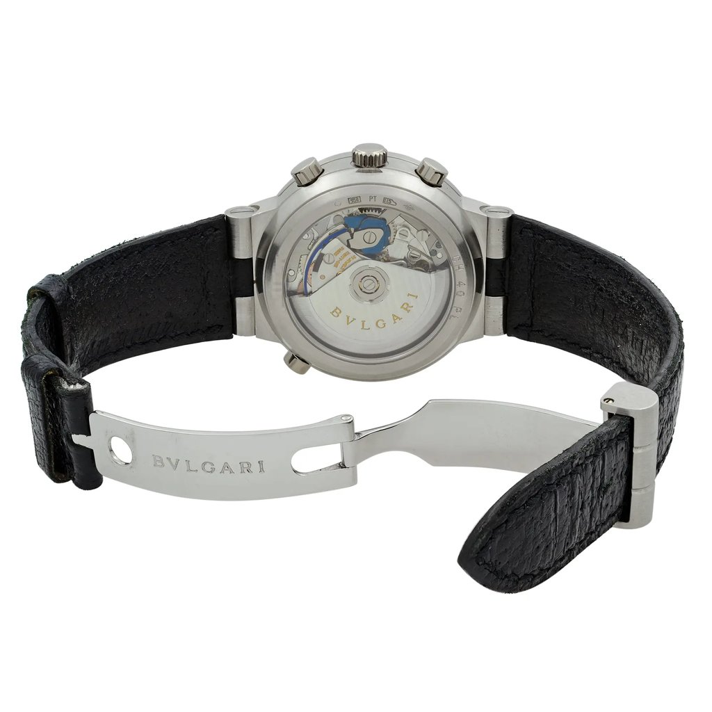 An image of a pre-owned Bvlgari men's wristwatch viewed from the back at a slight angle, showcasing the transparent case back and visible mechanical movement. The watch features a chronograph and small seconds subdial. The black leather strap is open and positioned towards the front, with the Bvlgari branding visible on the metal clasp. The image is taken from a close distance, highlighting the intricate details of the watch's design.