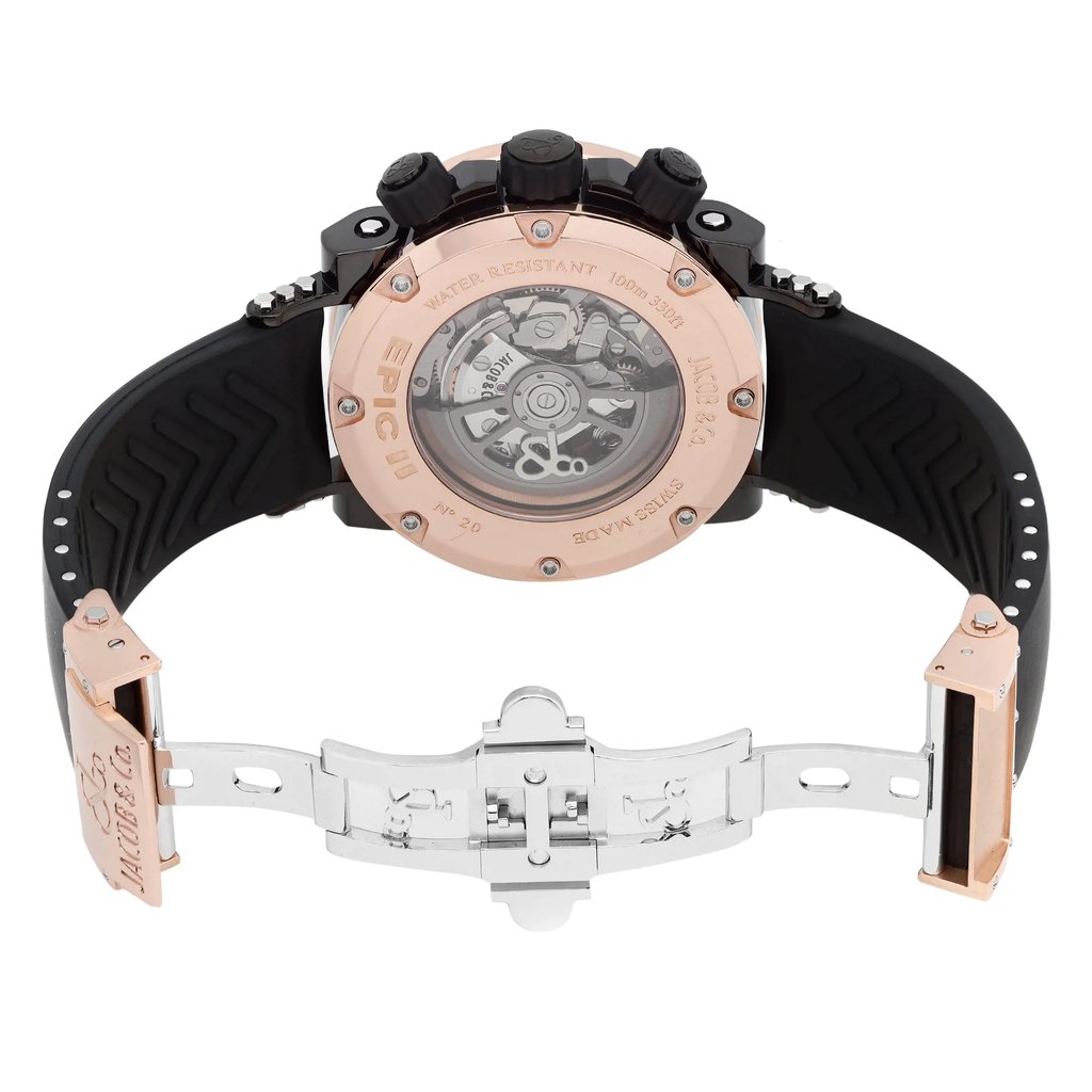 An image of a pre-owned wristwatch showing the back view with the clasp open. The watch is positioned horizontally, displaying the intricate inner mechanisms through a transparent case back. The angle provides a clear view of the rose gold-tone back casing, black strap, and silver clasp. The distance captures the entire watch with emphasis on the open clasp and detailed engravings.