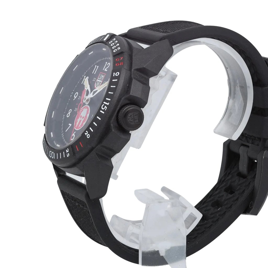 An image of a Wristwatch by Luminox. This Pre Owned item is designed for Men, featuring a Sport style. It has a Quartz movement and an Analog display with a Black dial color. The indices include 12-Hour Dial,Arabic Numerals,Easy to Read/Large Numerals. The band is made of Rubber and the case is made of Carbonox. The watch has a Round shape with a case size of 46 mm and a case thickness of 13 mm.