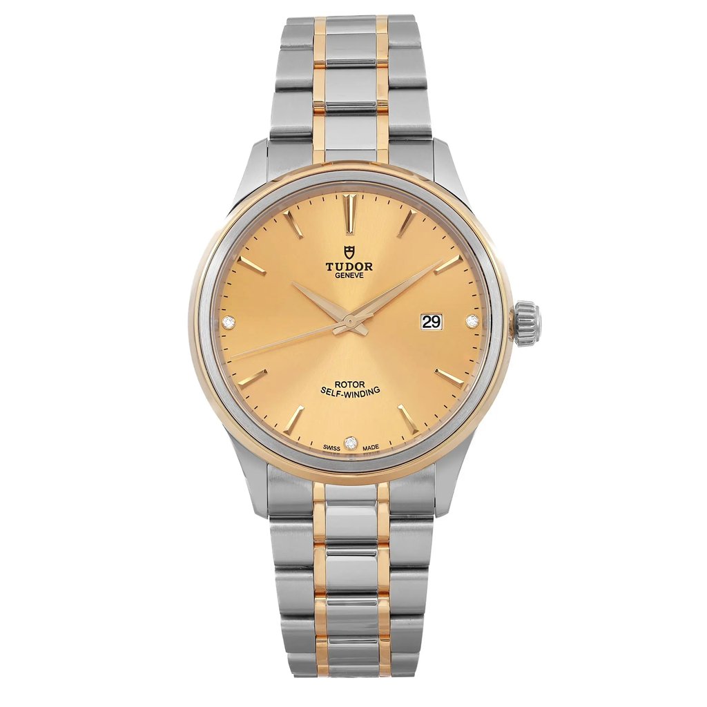 An image of an unworn wristwatch captured from a front full frontal view. The watch features a stainless steel and gold bracelet and a gold-toned dial with hour markers and a date display. The brand name is visible on the dial, and the watch appears to be positioned at eye level with a straight-on angle, highlighting its design and details.