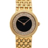 An image of a pre-owned women's Audemars Piguet wristwatch. The watch is positioned upright, showcasing a frontal view. It features a gold bracelet and a round, onyx dial surrounded by a ring of sparkling diamonds. The brand name is visible on the dial, and the watch is photographed from a close distance, capturing intricate details and angles.