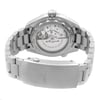 An image of a wristwatch taken from the back view, showcasing the detailed mechanics through a transparent case back. The angle is slightly elevated, providing a clear view of the movement inside. The stainless steel bracelet is prominently displayed, with the clasp closed, featuring the brand's logo engraved on it. The watch appears to be a display model, with pristine and polished surfaces visible in the close-up shot.