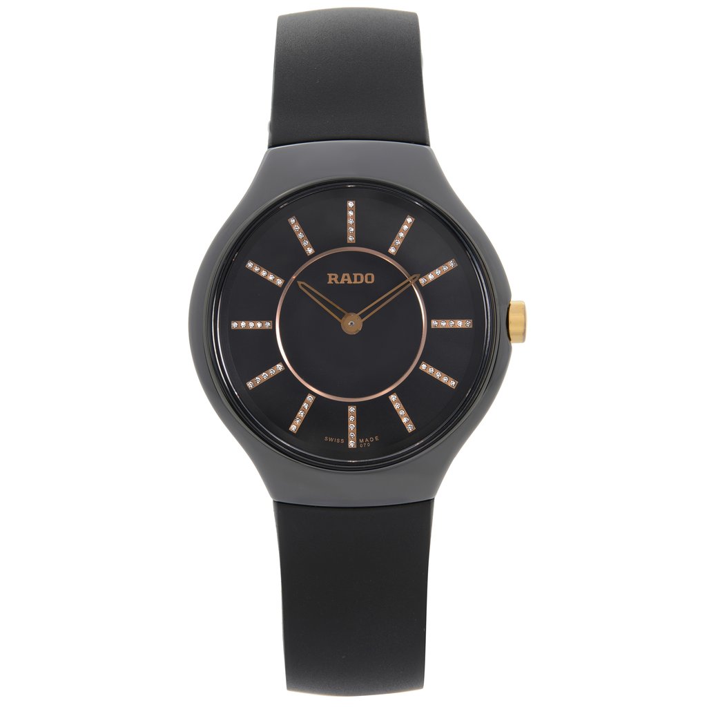 An image of a wristwatch captured from a front full frontal view. The watch features a dark strap and a matching dark face with gold accents and detailing. It is positioned directly facing the viewer, highlighting its sleek design and craftsmanship. Despite being new, the watch is noted to have defects. The image is taken at a close distance, offering a clear and detailed view of the watch's features.