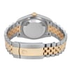 An image of a pre-owned men's Rolex wristwatch, viewed from the back at a slight downward angle. The focus is on the two-tone stainless steel bracelet, featuring both steel and gold links, with the clasp prominently displaying the Rolex logo. The watch case and crown are visible, showing the brushed texture of the metal. The image is taken from a close distance, highlighting the details of the bracelet and clasp.