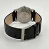 Back View Of Snap Back Case And Closed Leather Band Of Mondaine A672.30351.14SBB Watch Display Model Condition