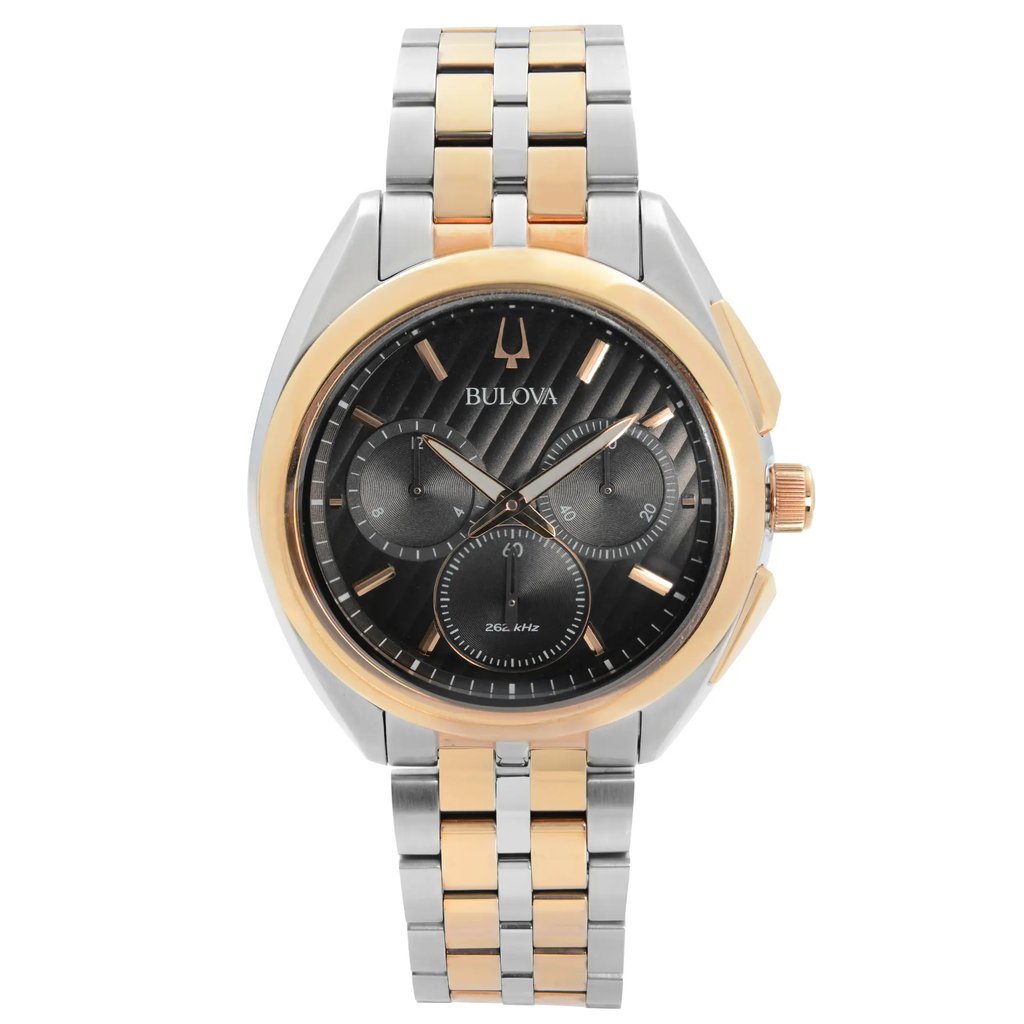 An image of a pre-owned Bulova men's wristwatch presented in a full frontal view, positioned centrally and up-close. The watch features a round stainless steel case with a gold bezel and a black dial. It includes a stainless steel band with gold accents. The dial has non-numeric hour marks, three smaller chronograph subdials, and luminous hands. The Bulova logo is visible at the top of the dial.