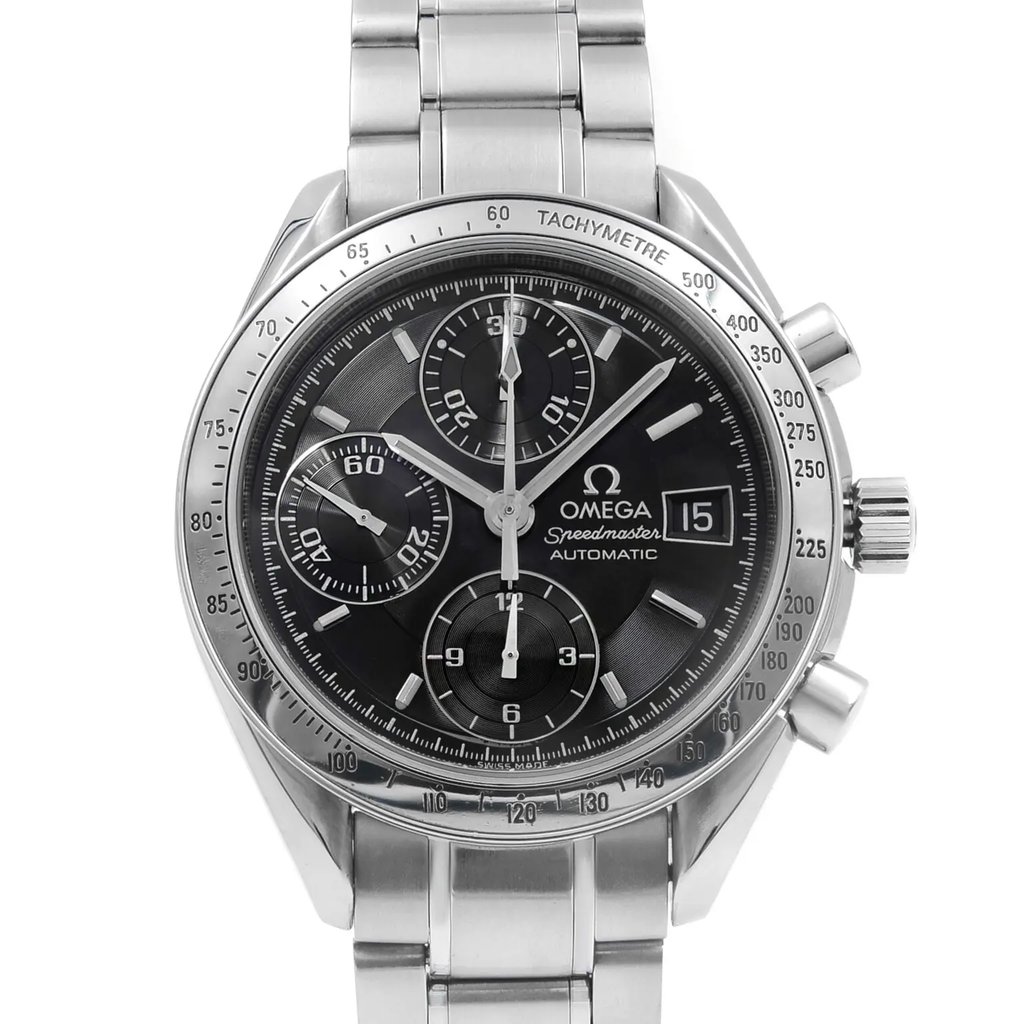 An image of a pre-owned OMEGA Speedmaster Automatic men's sport wristwatch. The front close-up shot shows the watch face at a direct angle and close distance, highlighting a black dial with non-numeric hour marks and stick indices, along with chronograph subdials and a date indicator at the 3 o'clock position. The hands are luminous. A minor dent is visible on the steel bezel. The round stainless steel case and band complete the design, reflecting its good condition despite being previously owned.