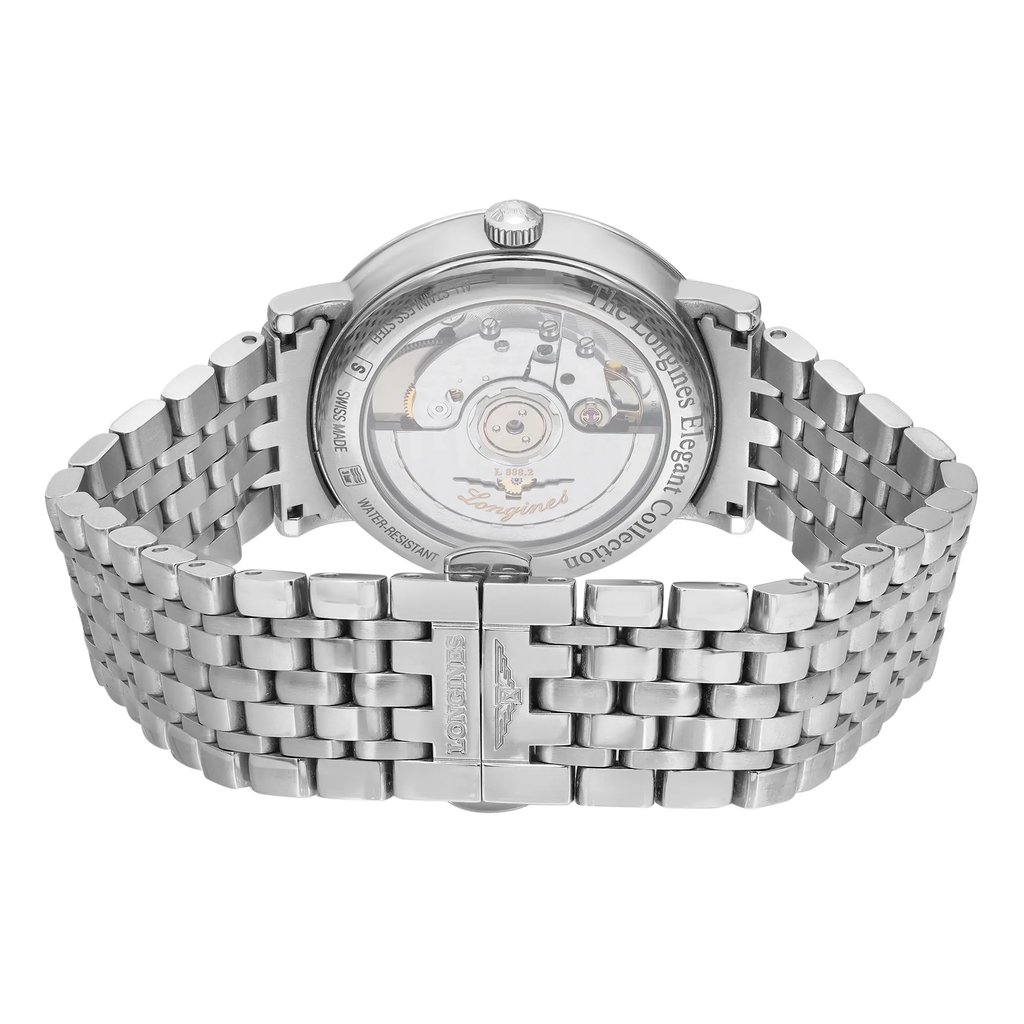 An image of a pre-owned wristwatch taken from the back view, showcasing the clasp in a closed position. The angle is centered, providing a clear view of the watch's intricate mechanics through the transparent case back. The watch features a silver metal link bracelet, and the shot is taken from a close distance to highlight details.