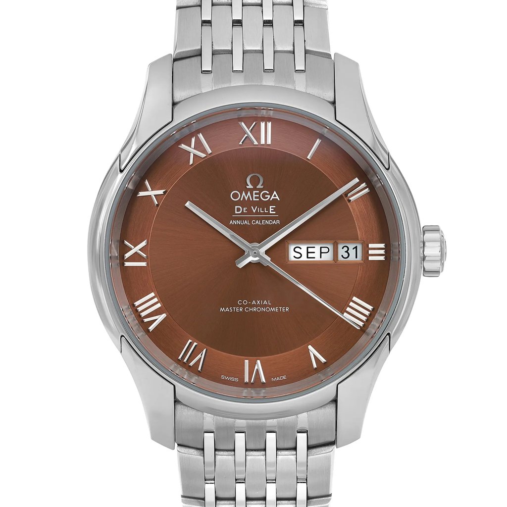 An image of a pre-owned OMEGA De Ville men's wristwatch in excellent condition, featuring a close-up front view of the round watch face. The watch has a sunburst brown dial with gray bezel, Roman numeral indices, and a day/date feature displaying "SEP 31". It has a stainless steel band and case. The watch is positioned centrally, with the camera angle directly in front for a clear, unobstructed view of the details. The distance is close enough to see text and texture but maintains full visibility of the watch face and part of the band.