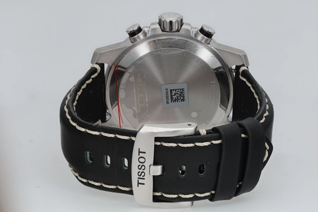 Back View Of Snap Back Case And Closed Leather Band Of Tissot T1256171605100 Watch Display Model Condition