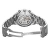 An image of a pre-owned TAG Heuer men's wristwatch, viewed from the back with an open clasp, positioned horizontally. The watch features an exhibition caseback displaying the internal mechanism, a stainless steel case and band, and a round shape. The fold-over clasp with double push-button release is visible and slightly open. The back of the watch is etched with the brand name and other details, indicating its Swiss-made heritage. The photograph is taken at a close distance, with a direct angle that provides a clear view of the watch's features. Minor blemishes may be present due to handling and shipping.