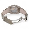 An image of a pre-owned Vacheron Constantin men's wristwatch viewed from the back. The watch is positioned at a slight angle, showcasing the transparent case back and intricate mechanical movements inside. The leather strap is partially open, with the clasp visible on the right side. The watch is positioned at a medium distance, highlighting its craftsmanship and detailing. The luminous hands feature is not visible from this angle.