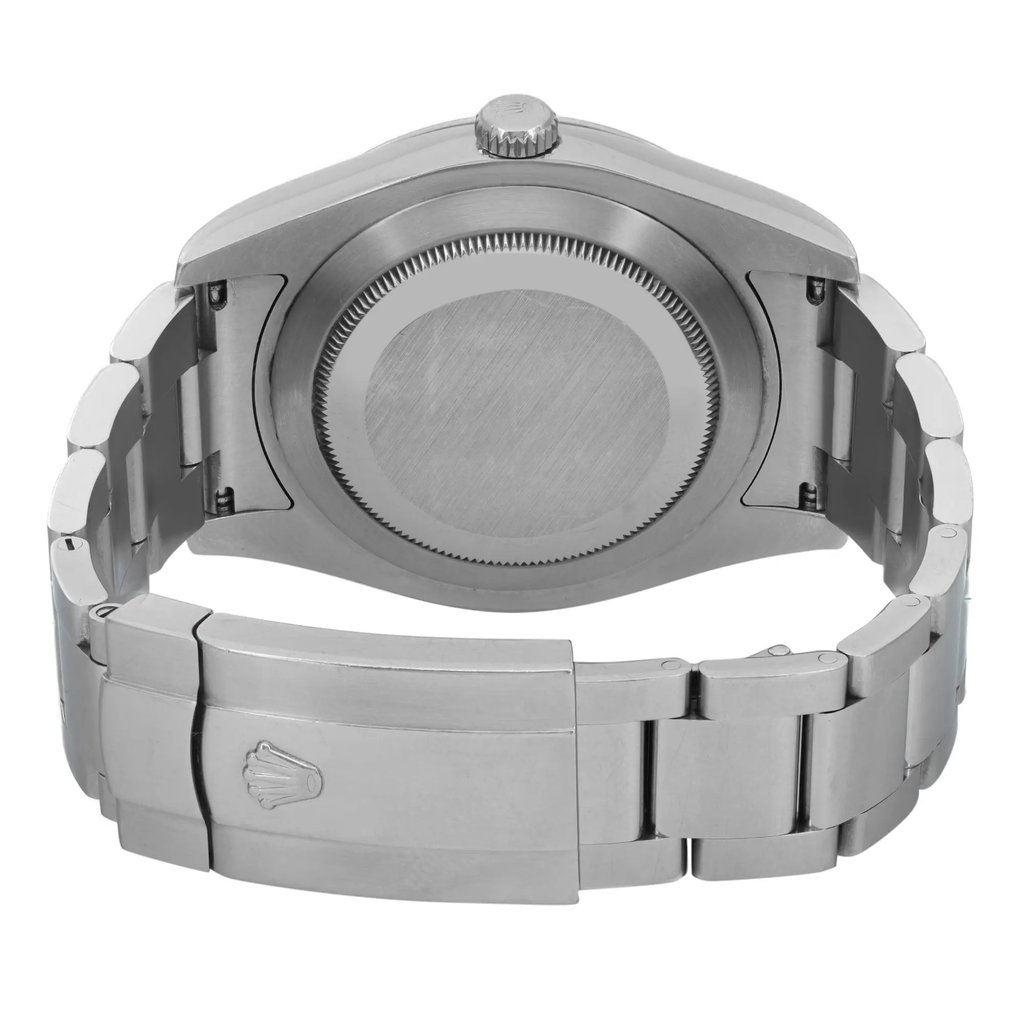An image of a pre-owned wristwatch showcasing the back view. The watch is positioned upright with the clasp closed, and the angle highlights the stainless steel bracelet and case back. The image is taken from a close distance, focusing on the detailed engravings and the overall metallic finish.