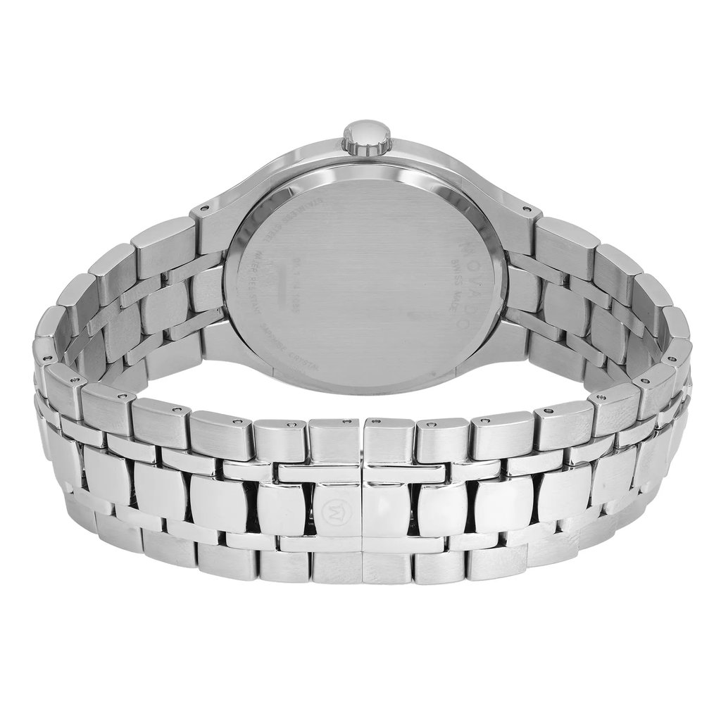 An image of a pre-owned wristwatch showing the back view, focusing on the closed clasp. The watch is positioned upright, with the camera capturing it from a slightly elevated angle at close range. The metallic bracelet and the back of the watch face are clearly visible, highlighting the design and material.