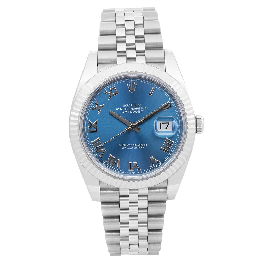 An image of a new Rolex Oyster Perpetual Datejust men's wristwatch, presented in a front full frontal view. The watch features a luxurious round blue dial with Roman numeral indices and a date indicator at the 3 o'clock position, all encased in stainless steel with a white gold bezel. Attached is a stainless steel band. The condition is excellent. The watch is photographed up close, capturing the entire face and band with clear visibility of details.