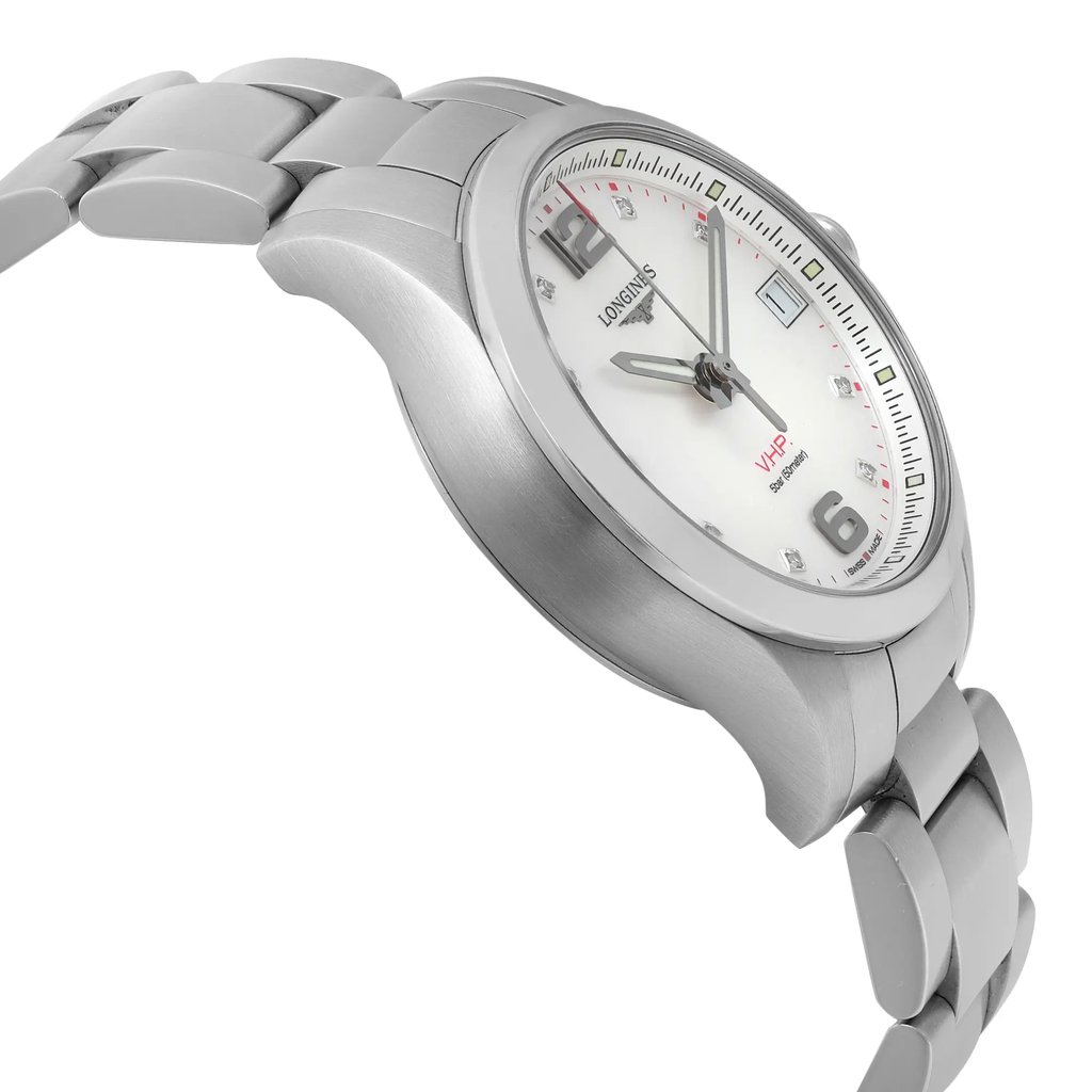 An image of a pre-owned Longines women's wristwatch in like-new condition, presented in a side profile view opposite of the crown. The watch features a round case and a stainless steel band, with a white mother-of-pearl dial and gray bezel. The dial includes hour markers and hands, and the image is taken from a close distance to show detail, with the focus on the side of the watch facing the viewer.